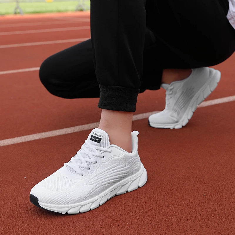 Spring Flying Knitted Breathable Running Shoes Sports Women Casual Shoes Soft Sole Couples Men And Women Small White Shoes