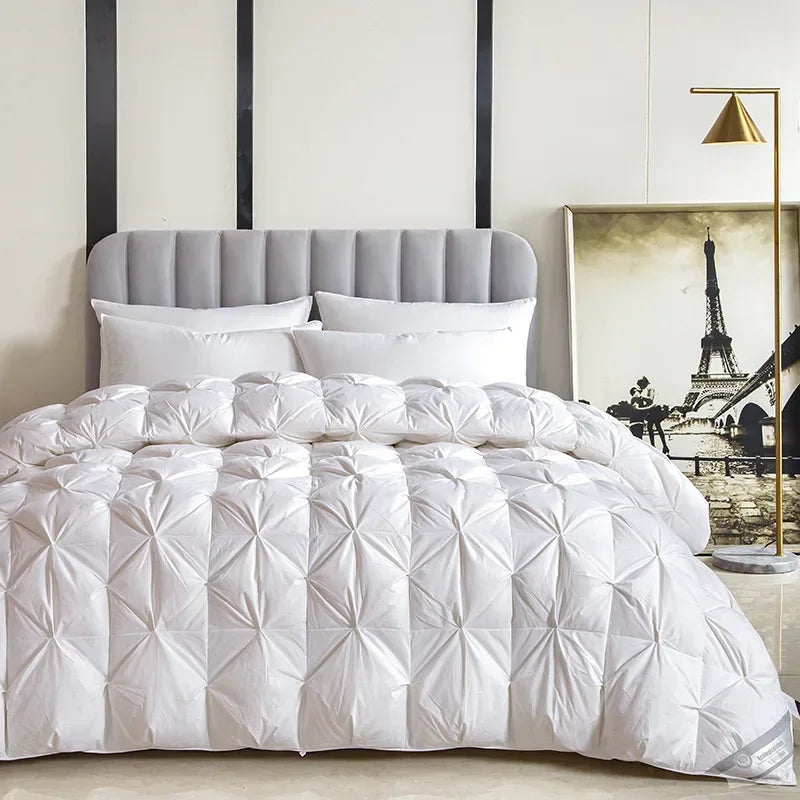 Temperature controlled down quilt,