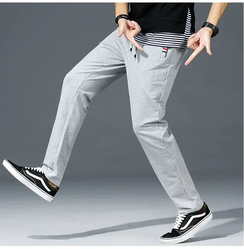Spring Pants Men Fitness Sportswear Tracksuit Elastic Waist Sweatpants Cotton Trousers Loose Gym Jogger Track Pants Mens M- 8XL