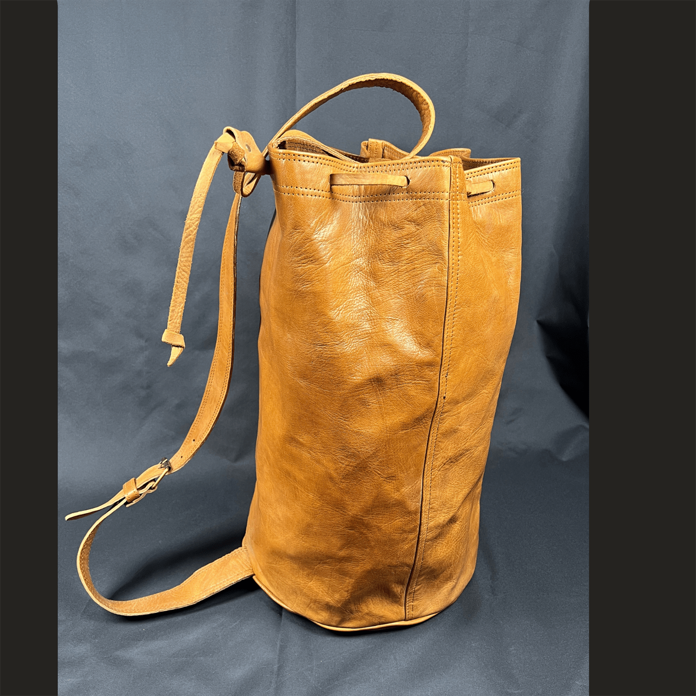 Leather Sling Backpack